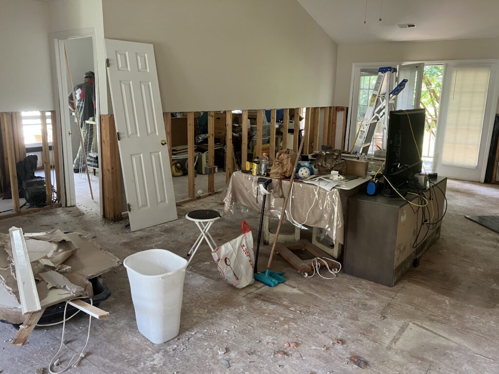 A Weatherhill Pointe home with the drywall and flooring ripped out after the flood